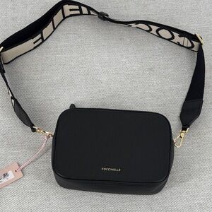 Coccinelle Black Crossbody Bag comes with dust bag